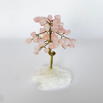 rose quartz tree on quartz base